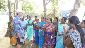 A senior  AV farmer teaching rural women in Tamil