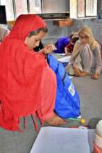 Children opening the RI Backpacks