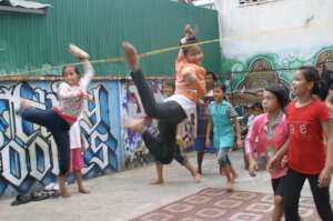 The girls dancing and playing during a break