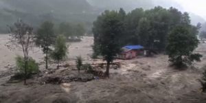 The Beas River surrounding a kennel with 27 dogs