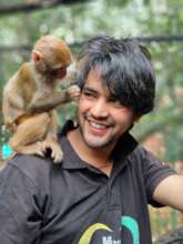 Jogi with Coco, our rescued Rhesus Macaque