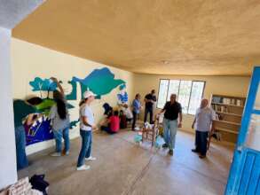 Working on a mural in new library