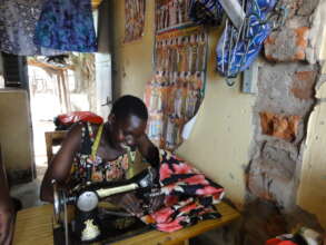 Former child soldier who openedher own tailor sto