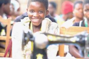 Young girls participating in tailoring skills trai