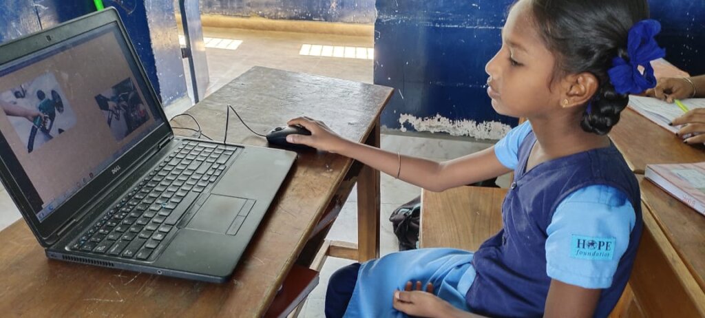 HOPE school students learning computers