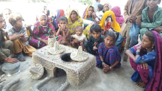 Children & Women happy with AHD Model cooking sto