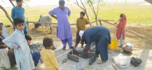 Male happy to learn smoke free cooking stove