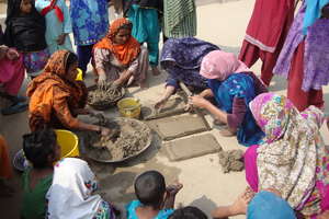 Women making bricks for stove making