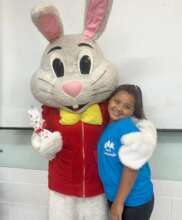 Child hugging the Easter Bunny