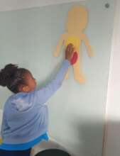 Child at May 18 event on abuse prevention work