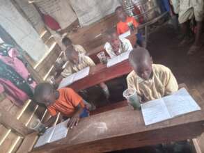 School children drinking spirulina