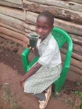 Child drinking spirulina