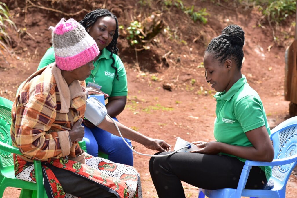 A CHV conducting BP Screening