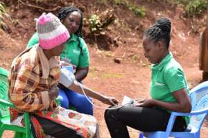 A CHV conducting BP Screening