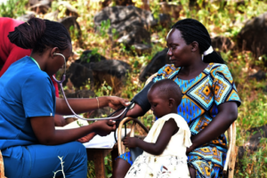 Our nurse conducting blood pressure screening.