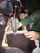 Girl busy in Sewing at School