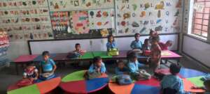 Early ed room with alphabet in Nepali and English