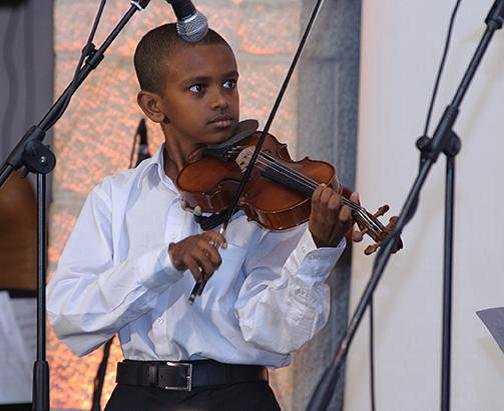Abraham - a violinist performing in London