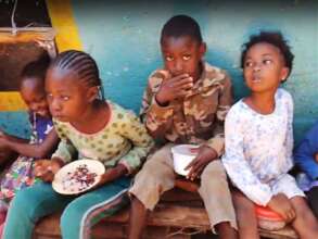 Children get a hot meal at Elimu