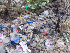 About to be cleared: trash at Highway Boys School