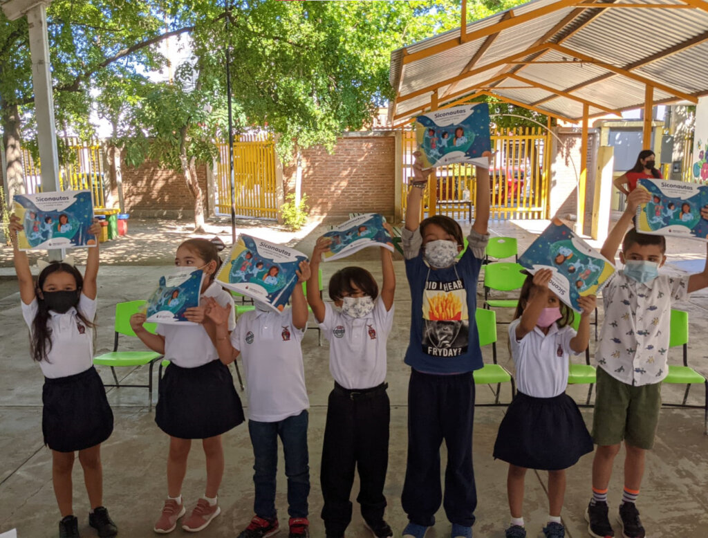 Preschool students with EW's textbooks