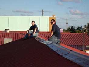 Baker engineers on the roof
