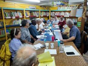 Board members meet in the school Library