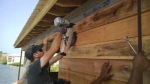 volunteers work on Phase 4 site construction