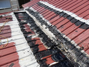 tearing out section of roof needing repair
