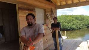 Local Belizeans working on school housing