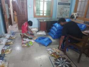 AHD staff preparing food items