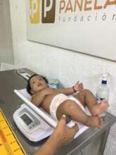 monitoring weight and height of newborn baby