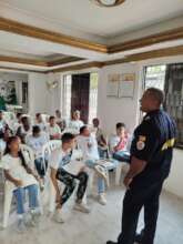 A firefighter giving a class