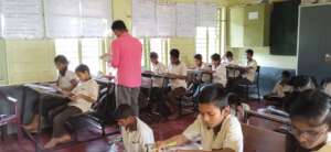 Students giving exams at the school