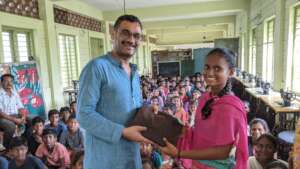 Students receive school uniforms