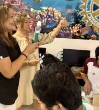 Local Dentist teaching about dental care