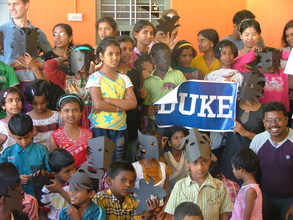 Children engaging with Volunteers