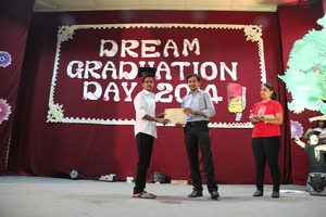 Receiving Graduation Certificate on Graduation Day