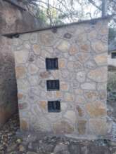 Side of a long drop toilet/loo