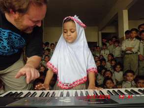 Little Girl Plays A Piano For The First Time