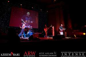 Todd singing with Atif and his band