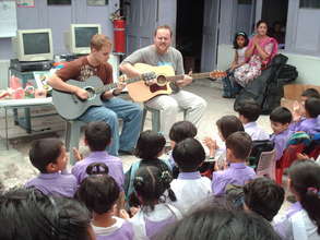 Todd And Tim Shea Singing With Pakistani Children