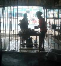 Victoria selling stockfish to a customer