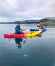 Volunteers doing water clarity testing in the lake