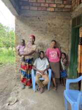 Janeth (pink t-shirt) and her family