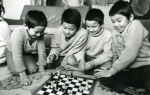 Children play Chess at the UK Village in the 1960s