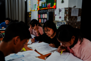 Students studying for exams, India.