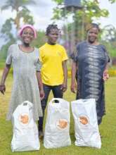The 3 ladies of WOW 8 receiving Christmas Hampers