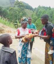 Ms. Nice vaccinates a farmer's chickens in Itoya