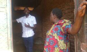 Staff offering support and supervision to a farmer